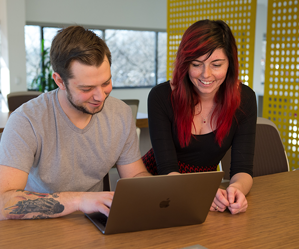 coworkers on computer